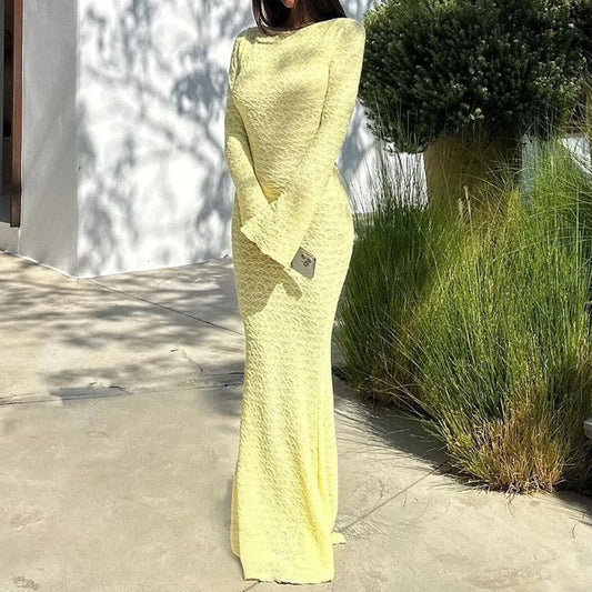 Sexy backless solid color trumpet long sleeved round neck long dress